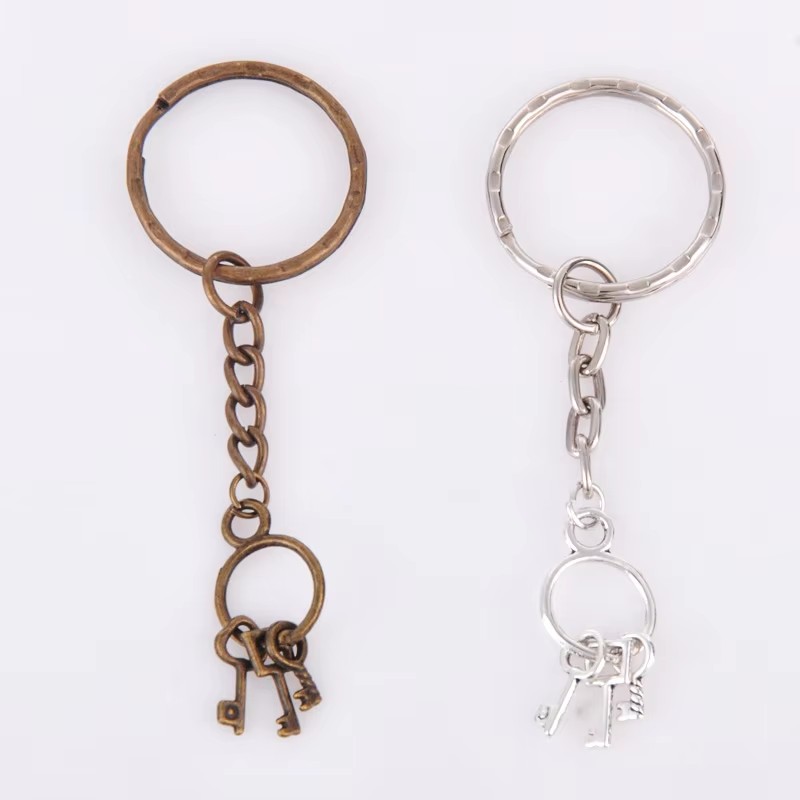 Ethnic Fashion Boutique - Vintage Silver Color Bronze Ethnic Keychain